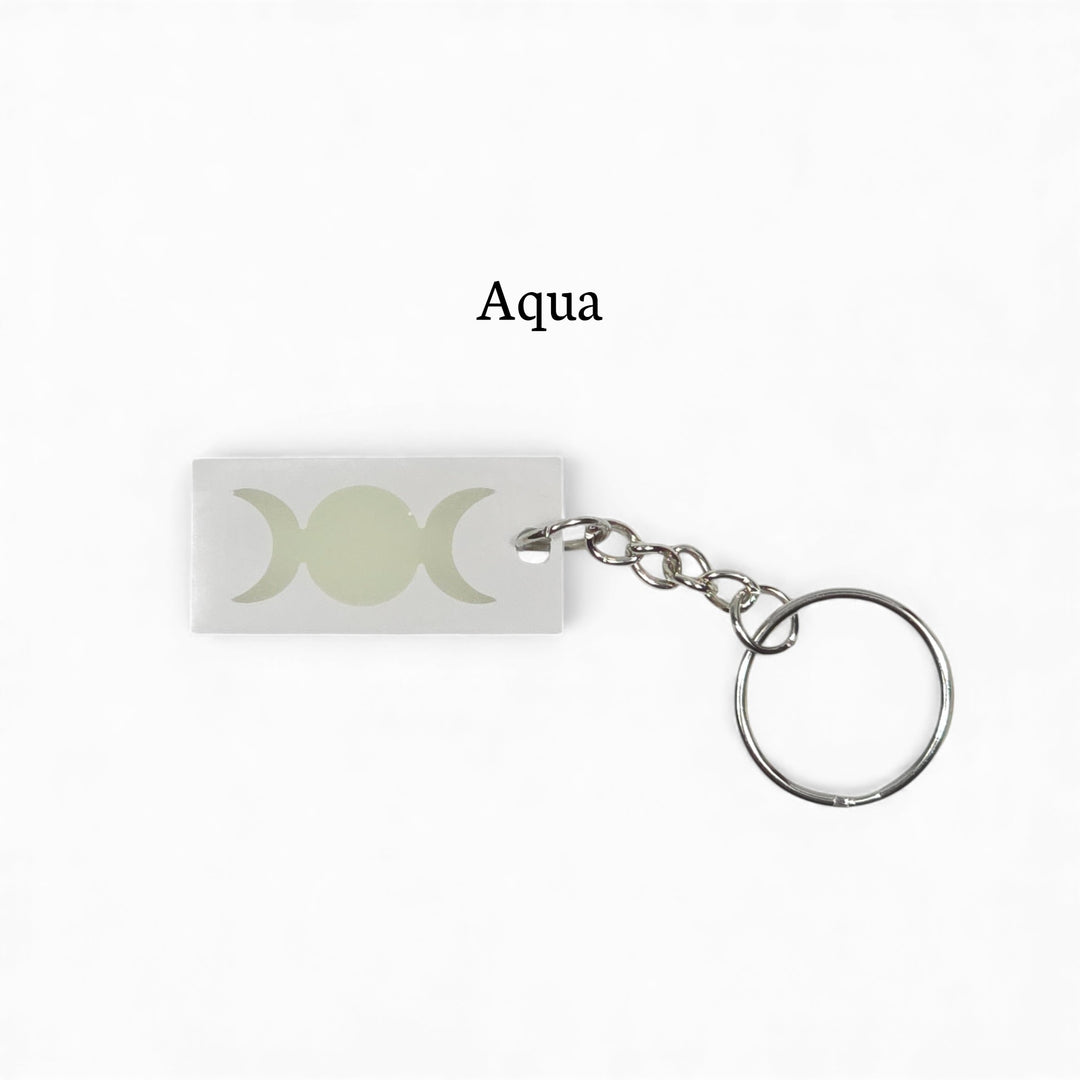 Porte-clés Trois Lunes – Phosphorescent