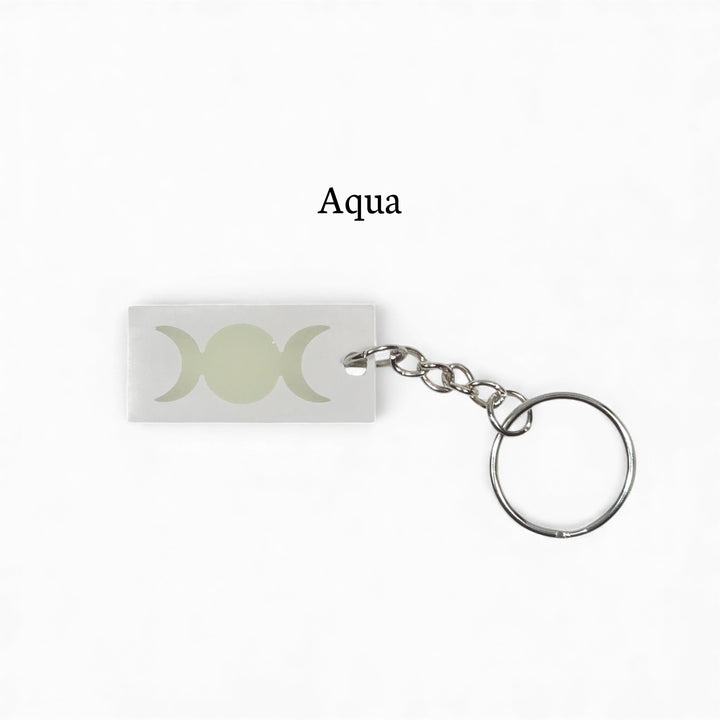 Porte-clés Trois Lunes – Phosphorescent