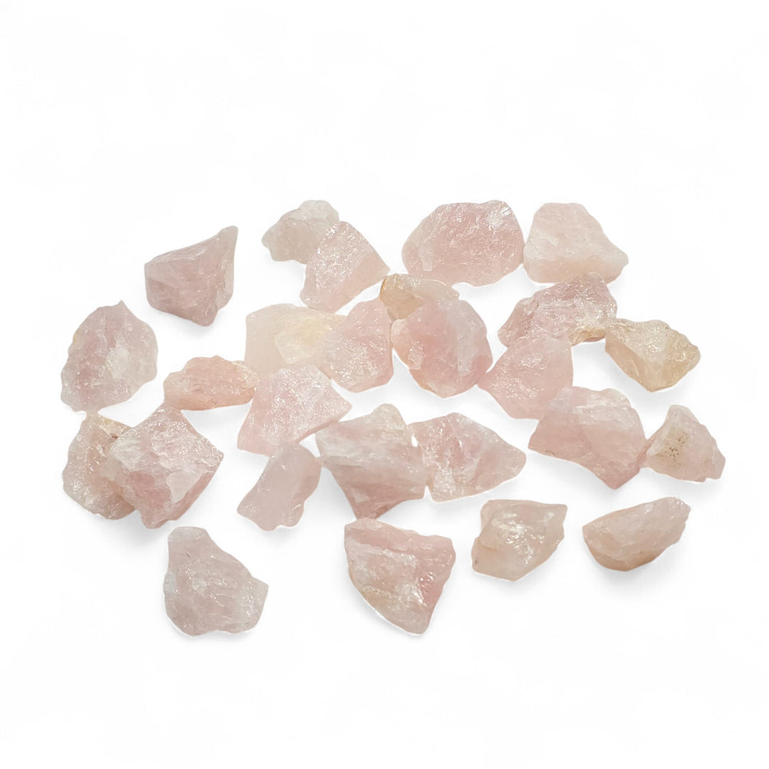 Quartz Rose brut de l'Inde, pierre délicate aux énergies douces, favorisant la guérison émotionnelle et l’ouverture du cœur.